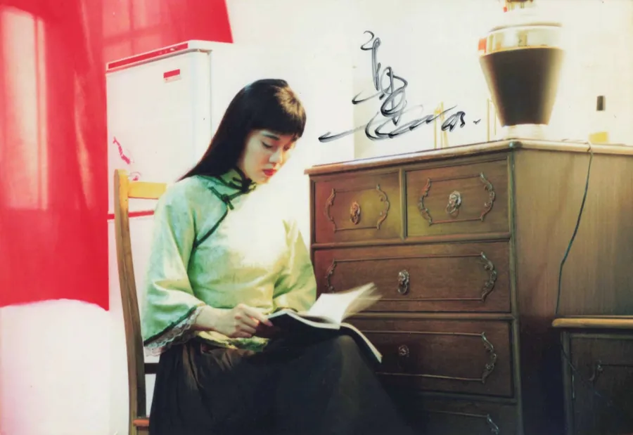 Esther reading, in a portrait from her professional life in China