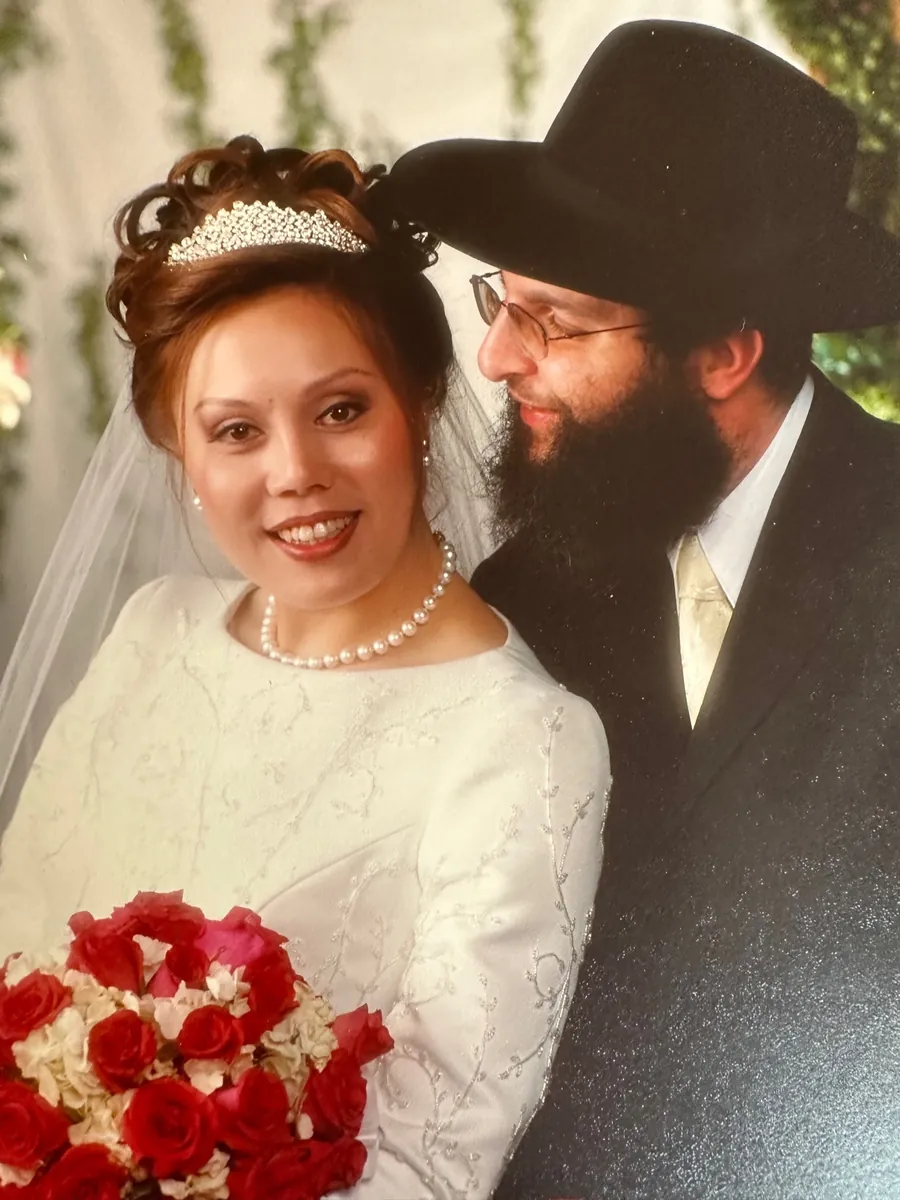 Esther and Haim on their wedding day